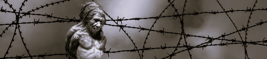 A Cromagnon in front of barbed wire in the Middle East, with the ONU logo.